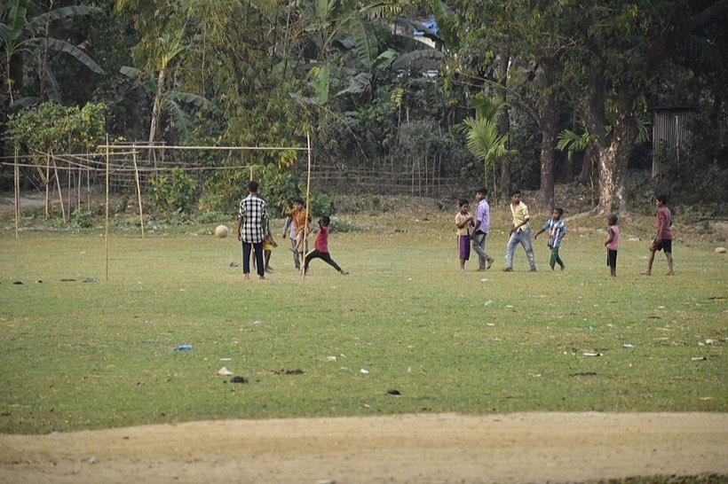 Children playing outside. Children are living things.