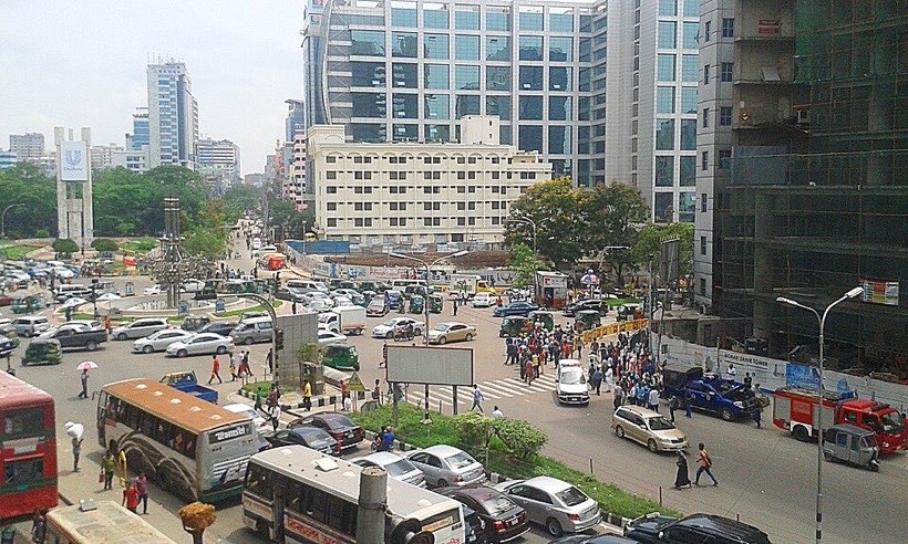 A busy street in Dhaka is full of sounds.
