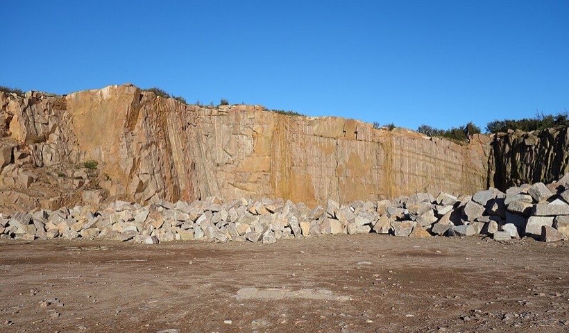 A quarry is a place where rock is dug out of the ground.