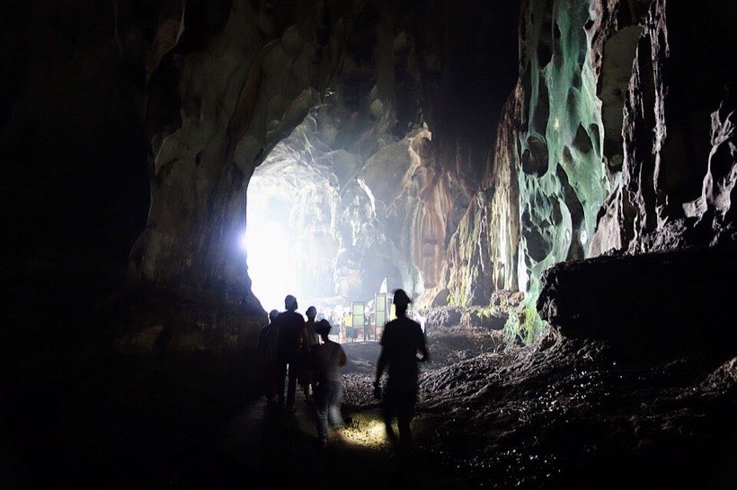 Deep inside a cave it is very dark.