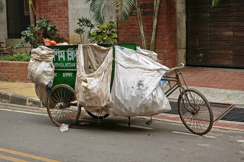A rickshaw puller uses a force to move the rickshaw.