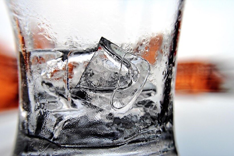 An ice cube keeps its shape and volume.