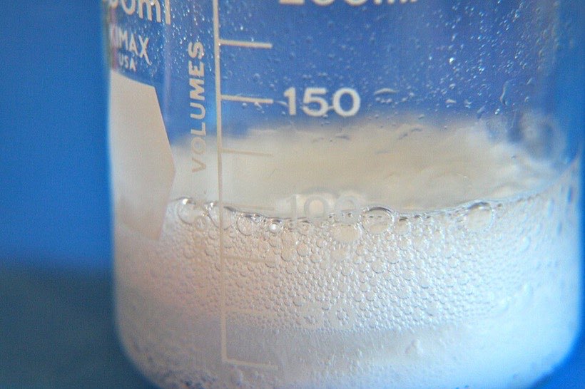 Bicarbonate of soda and vinegar fizz as a new gas is made.