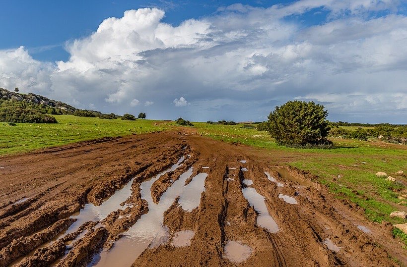 After the rain stops, puddles slowly dry up in the sun.