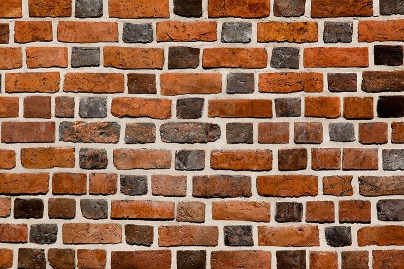 Even a rough brick wall reflects some light – that is how we see it.