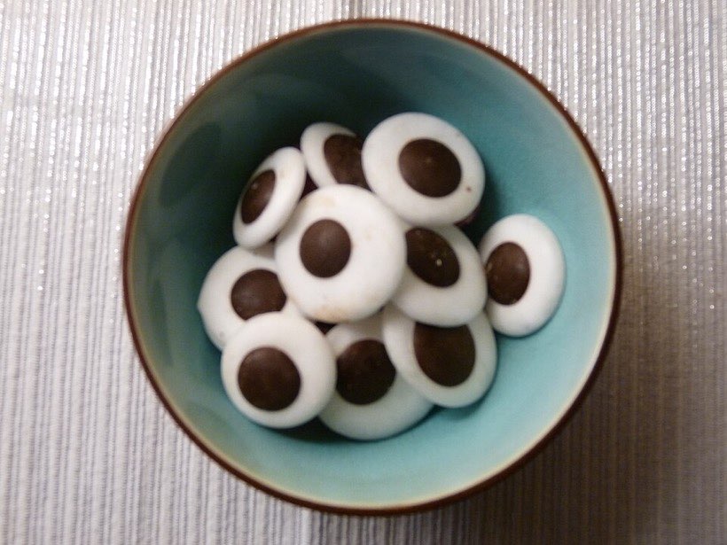 Sweets sorted into two bowls: two parts make the whole.