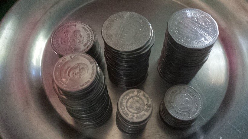 Piles of taka coins.
