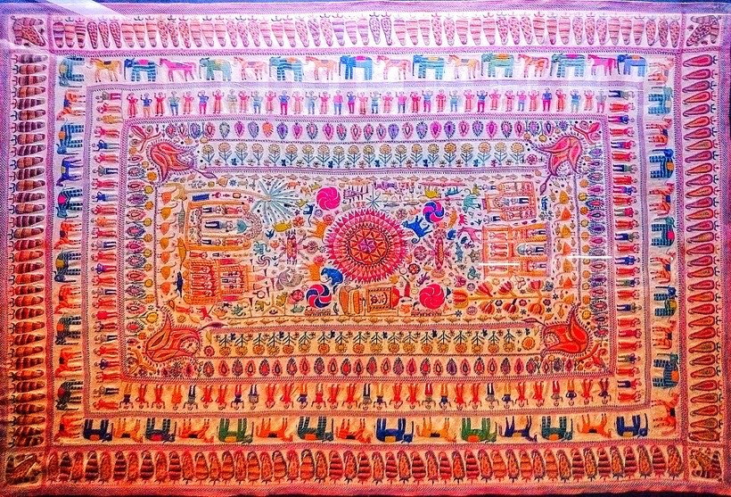 Nakshi kantha quilts are stitched with beautiful repeating patterns.