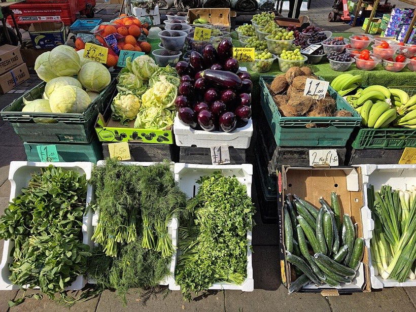 Fruit and vegetables sorted at a market.