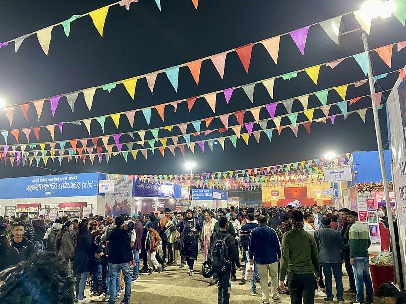 A big crowd at a fair.
