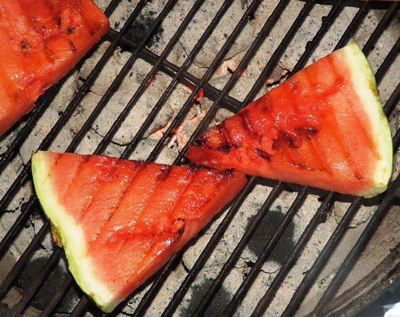 A watermelon cut into equal slices.