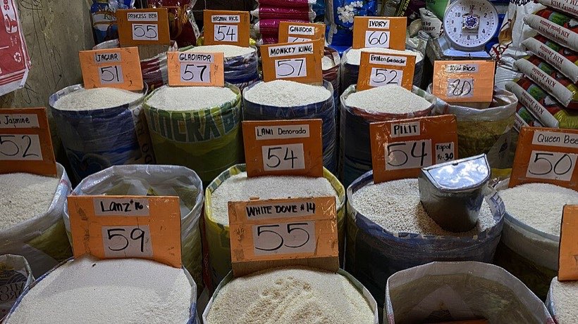 Rice for sale in sacks at a market.