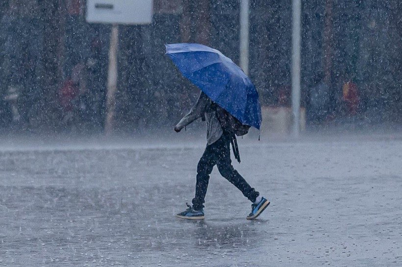 Umbrellas are common in the monsoon.