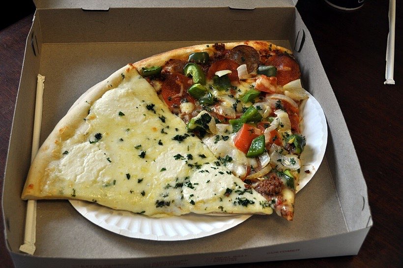 A pizza cut into 8 equal slices.