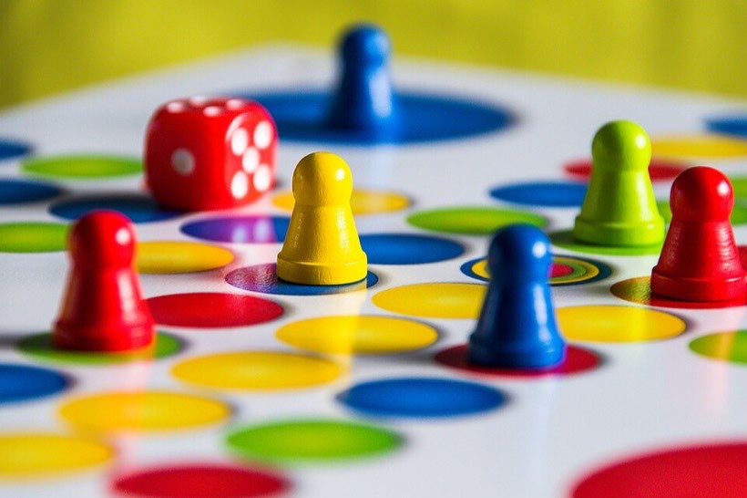 Dice used in board games like Ludo.
