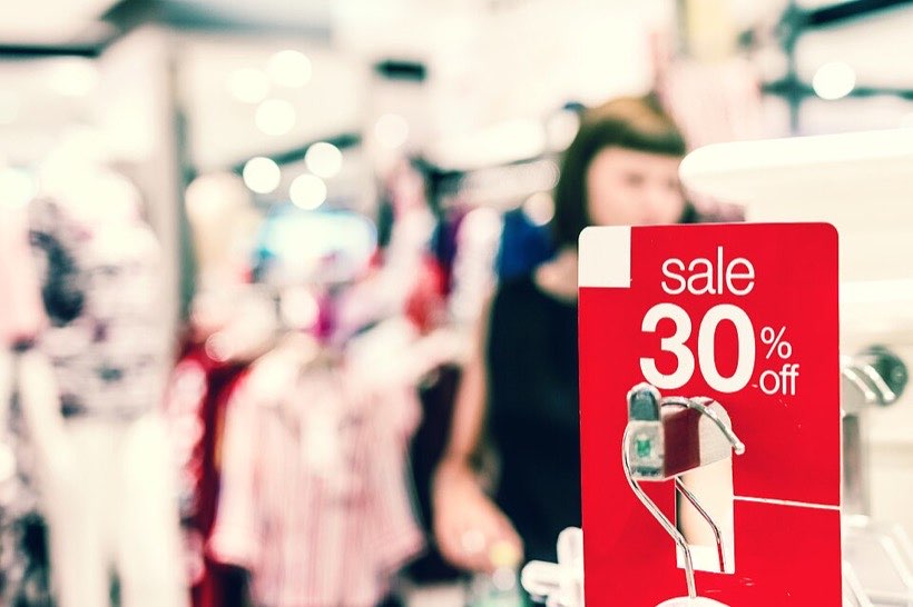 Shops offer discounts during festival sales.