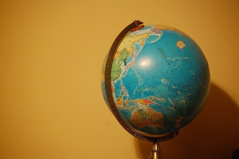 Globes use lines of latitude and longitude.
